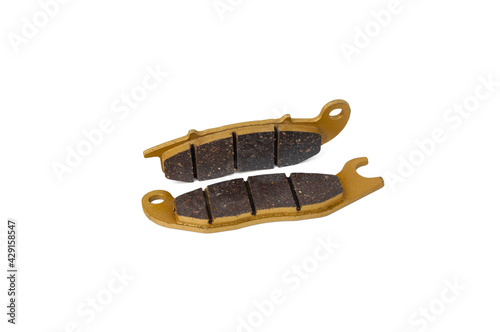 Brake pads for motorcycle disc brakes isolated on white background.
