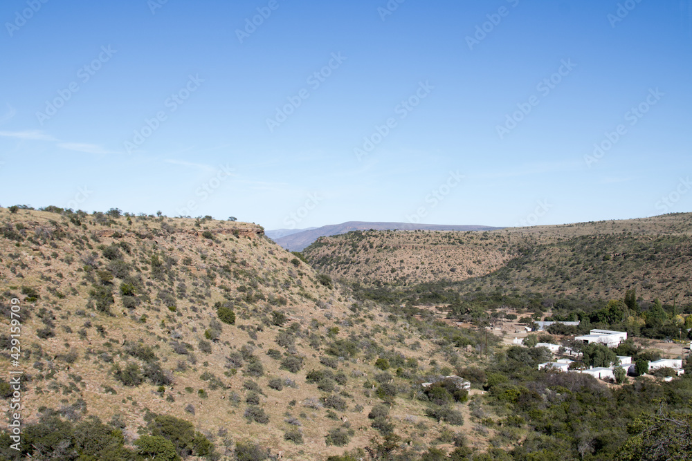 View of distant farmhouse in the Karoo South 
Africa