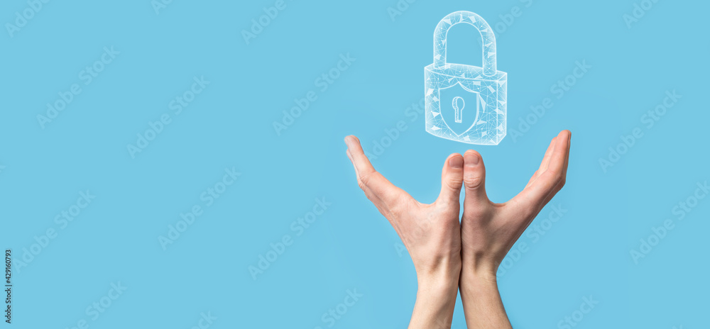 Male hand holding a lock padlock icon.Cyber security network. Internet technology networking.Protecting data personal information on tablet. Data protection privacy concept. GDPR. EU.Banner Male hand holding a lock padlock icon.Cyber security network. Internet technology networking.Protecting data personal information on tablet. Data protection privacy concept. GDPR. EU.Banner