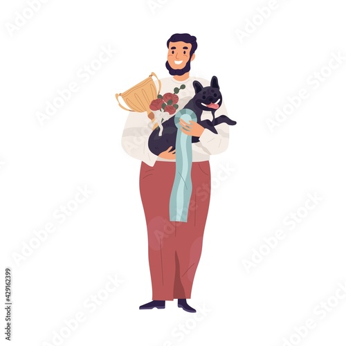 Portrait of happy pet owner holding cute dog and golden cup for doggy show's ...
