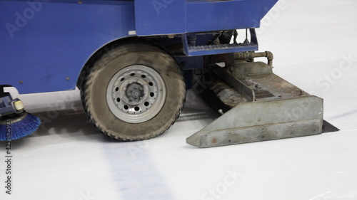 Ice recondition machine car close up, ice rink ice surface maintenance service for sport