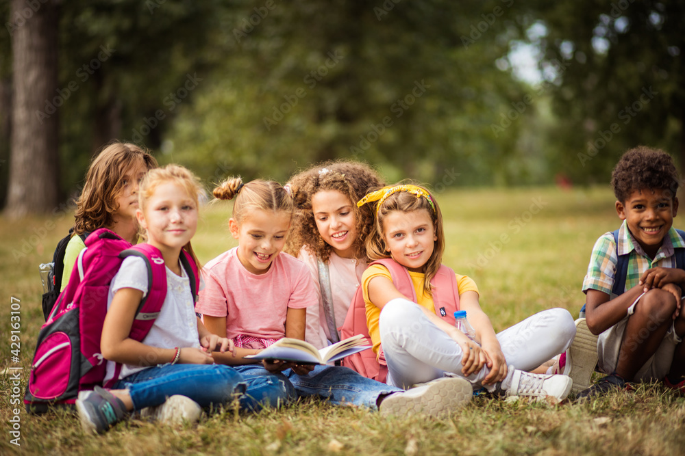 Group of school kids learning together. Group of school kids learning together.