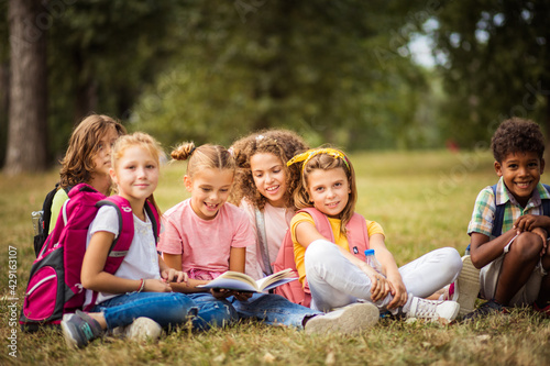 Group of school kids learning together.