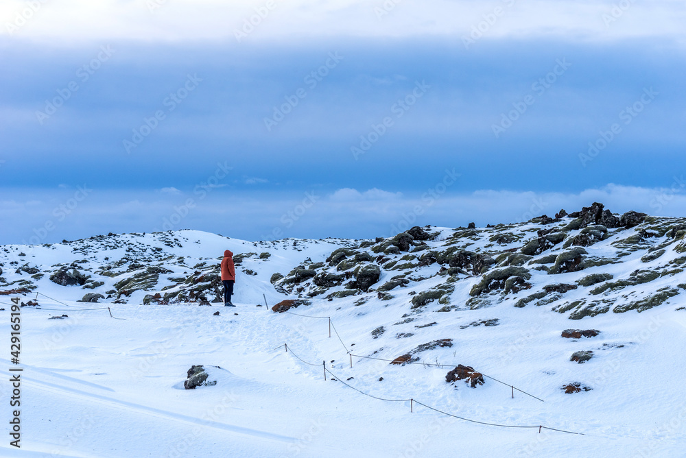 Typical Icelandic winter landscape with picturesque blue sky. Beautiful winter landscape with mountains covered snow, cold frosty weather and white field in Iceland. Typical Icelandic winter landscape with picturesque blue sky. Beautiful winter landscape with mountains covered snow, cold frosty weather and white field in Iceland.