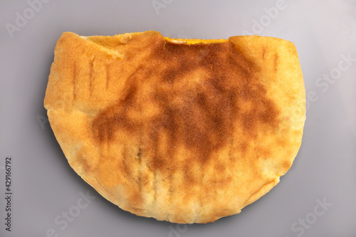 shawarma with chicken filling in baked tortillas on a gray background photo