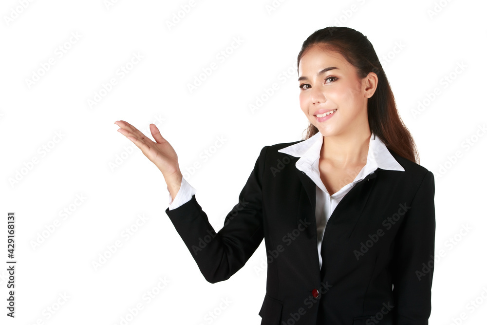 Portrait of Smiling Asian woman is beautiful wearing black suit showing welcome gestures in white background. Concept welcoming business with white isolated. Portrait of Smiling Asian woman is beautiful wearing black suit showing welcome gestures in white background. Concept welcoming business with white isolated.