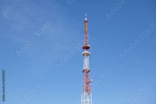 TV Tower against A Blue Sky. Concept TV, Broadcast, Communications, Information, News