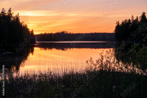 Fototapeta Naklejka Na Ścianę i Meble -  Sunset over lake with reflection in Tampere, Finland