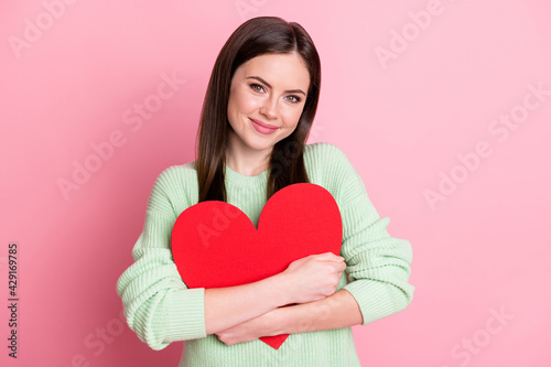 Photo of charming person hold hugging heart figure light green sweater isolated on pink color background