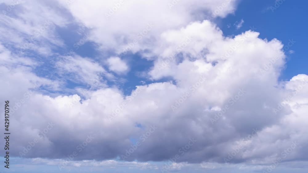 Blue sky white clouds, Building motions clouds cloudscape timelapse. Summer blue sky time lapse. Nature weather blue sky in good weather day White clouds background. Cloud time lapse nature landscape Blue sky white clouds, Building motions clouds cloudscape timelapse. Summer blue sky time lapse. Nature weather blue sky in good weather day White clouds background. Cloud time lapse nature landscape