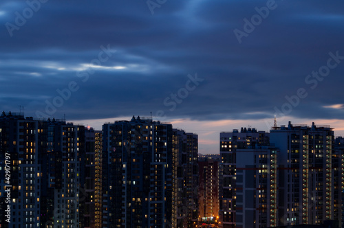 evening sunset sky clouds over the big city