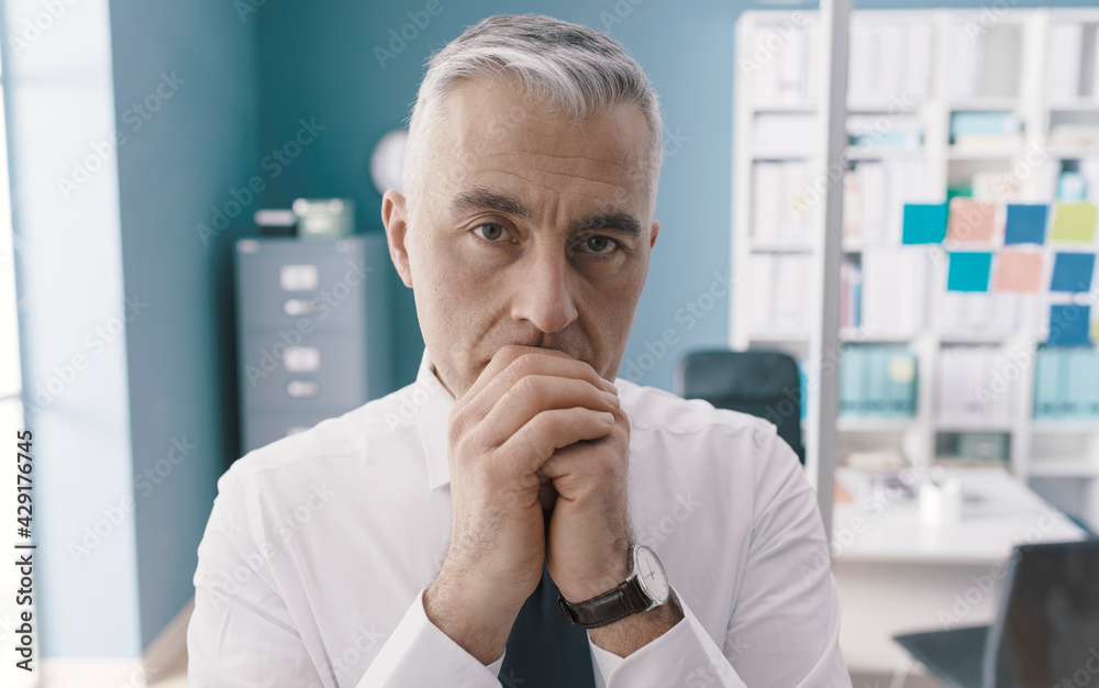 Pensive businessman taking a decision Pensive businessman taking a decision