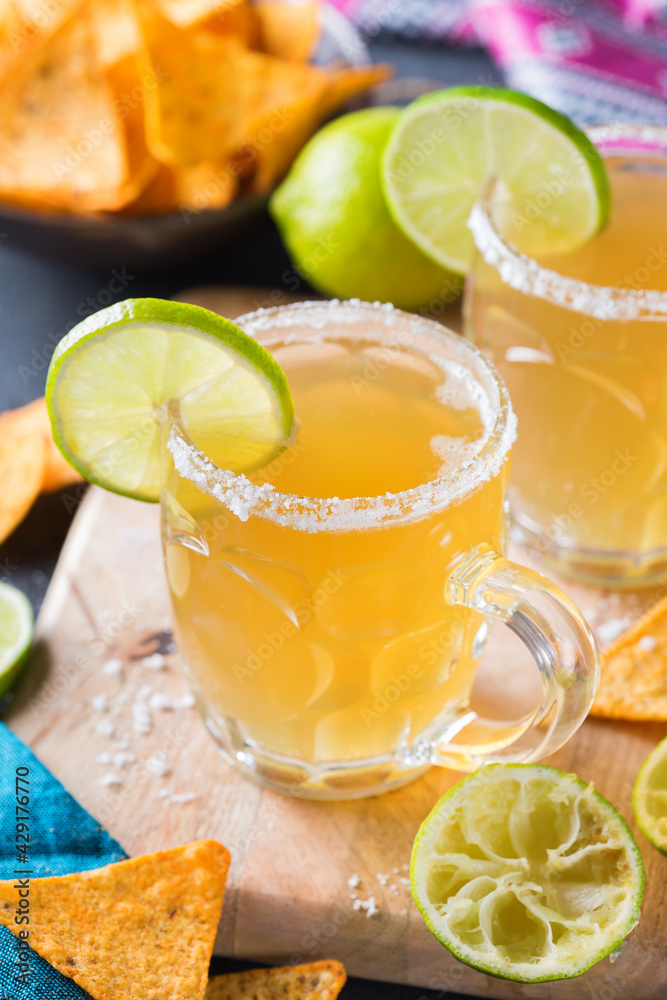 Fototapeta premium Mexican alcohol cocktail chelada with light beer and lime juice