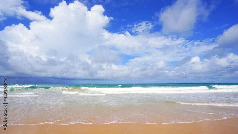 Summer sandy beach Amazing sea clear blue sky and white clouds Wave crashing on sandy shore empty beach at Phuket Thailand, Empty beach after covid-19 Concept Travel and season tour website background Summer sandy beach Amazing sea clear blue sky and white clouds Wave crashing on sandy shore empty beach at Phuket Thailand, Empty beach after covid-19 Concept Travel and season tour website background