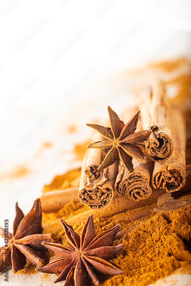 Cinnamon sticks and powder with star anise on copy space Cinnamon sticks and powder with star anise on copy space