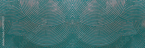 Wall with abstract circles. Metallic luster. Color - Blue Stone, Hue Green. The concept of a fantastic pattern for a backdrop.