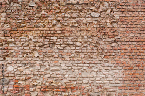 Old red brick wall texture Background. Texture for interior or exterior design. Alte rote Backsteinwand textur Hintergrund. Textur für Innen- oder Außen Design.