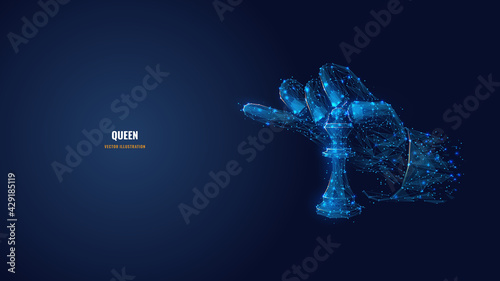 Abstract 3d hand holding chess piece queen isolated in dark blue background. Low poly mesh wireframe consisting of connected dots, lines and triangles. Digital vector image of chess game concept 
