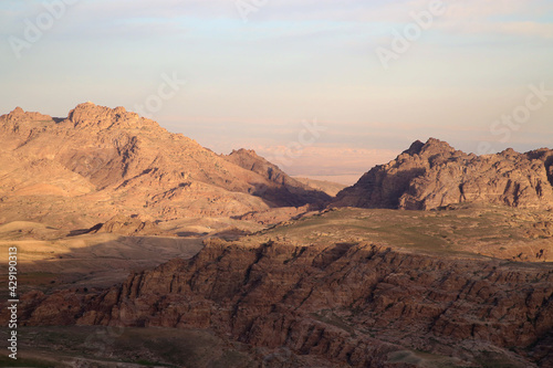 Fototapeta Naklejka Na Ścianę i Meble -  Morning lights on the mountains near the ancient city of Petra
