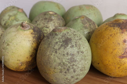 green colored ripe wood apple stock