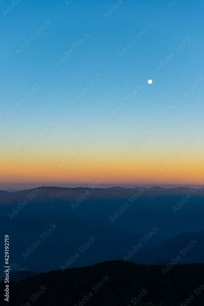 the moon over mountain in morning the moon over mountain in morning