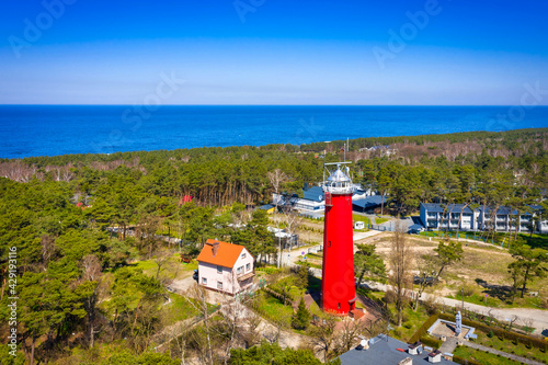 Red Lighthouse in the Krynica Morska town on the Vistula Spit. Poland photo