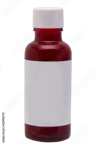 Rose water cosmetics. Closeup of a brown glass bottle with rose water for face or other product. Container with empty label isolated on a white background. Macro.