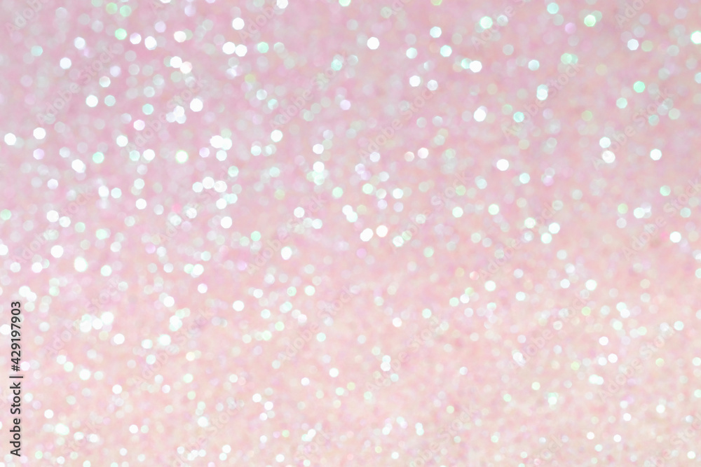 Shiny blurred pink background with bokeh for a festive mood. Greeting card template for entertainment. Shiny blurred pink background with bokeh for a festive mood. Greeting card template for entertainment.