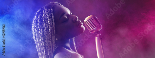 Black african woman singing - glamor show photo