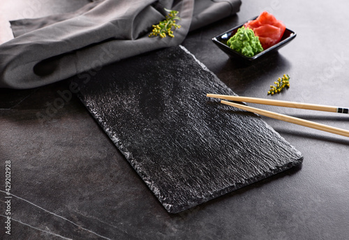 Cuadro en lienzo Asian cuisine - Black Slate Plate with Chopstick