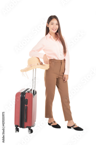 Traveler tourist woman with suitcase on white colored background. concept of travel.