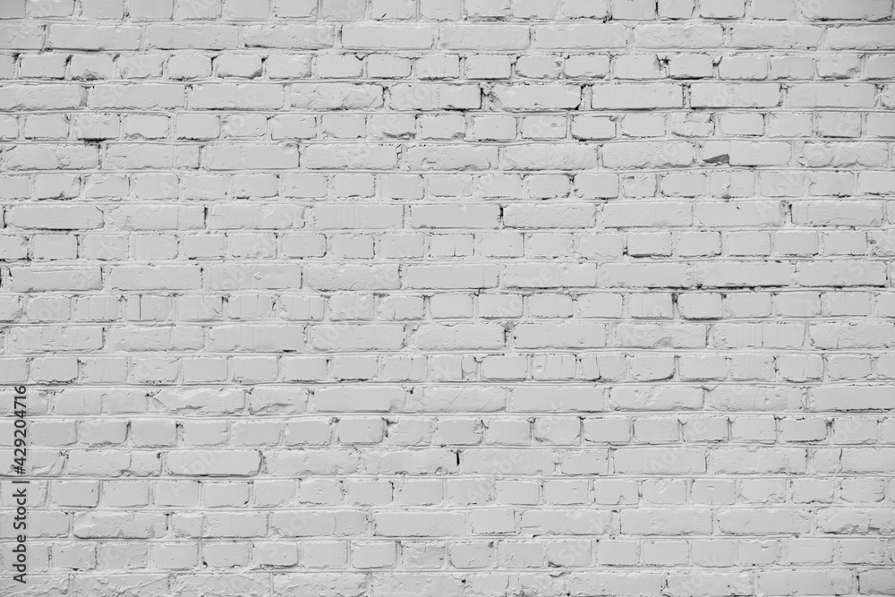 Obraz premium White brick wall, perfect as a background.