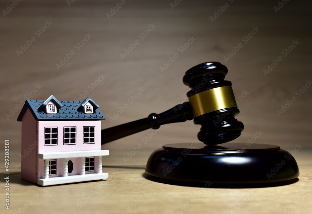 Real Estate Purchase and Sale Transaction Litigation. Sale of Real Property Lawyer. Seller backs out of transaction. House and Mallet of judge in courtroom. Legal excuse and Justice concept. Real Estate Purchase and Sale Transaction Litigation. Sale of Real Property Lawyer. Seller backs out of transaction. House and Mallet of judge in courtroom. Legal excuse and Justice concept.