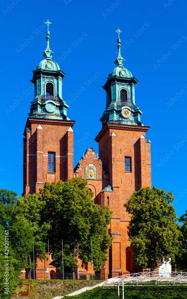 Gniezno, Poland - July 1, 2015: Gothic cathedral of Virgin Mary Assumption and St. Wojciech at Lech Hill in old town historic city center of Gniezno in Grater Poland region