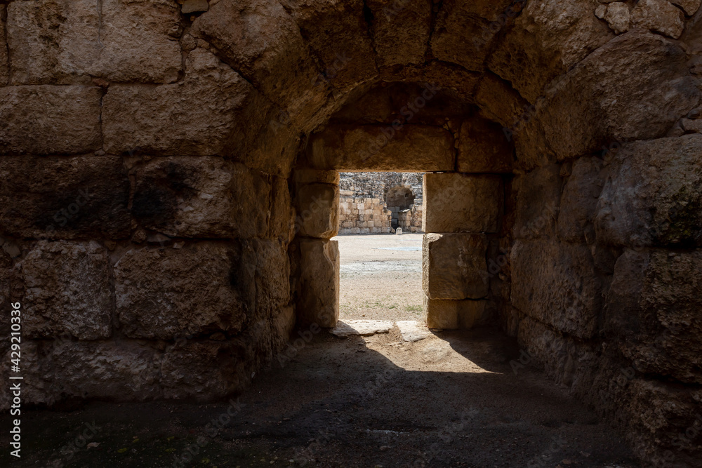 Exit from  the tunnel under the tribune to the arena, in the ruins of the Beit Guvrin amphitheater, near Kiryat Gat, Israel