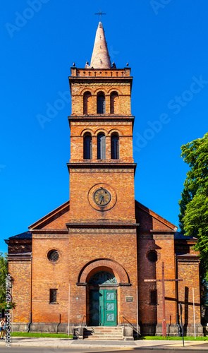 Church of Holy Virgin Mary Queen of Poland at Chrobrego street in old town historic city center of Gniezno in Grater Poland region photo