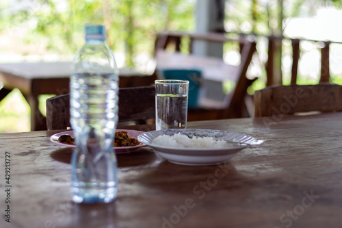 A glass of water on the dining table