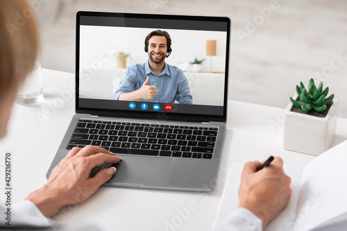 Business Video Call. Unrecognizable Businesswoman Having Online Meeting With Colleague Via Teleconference