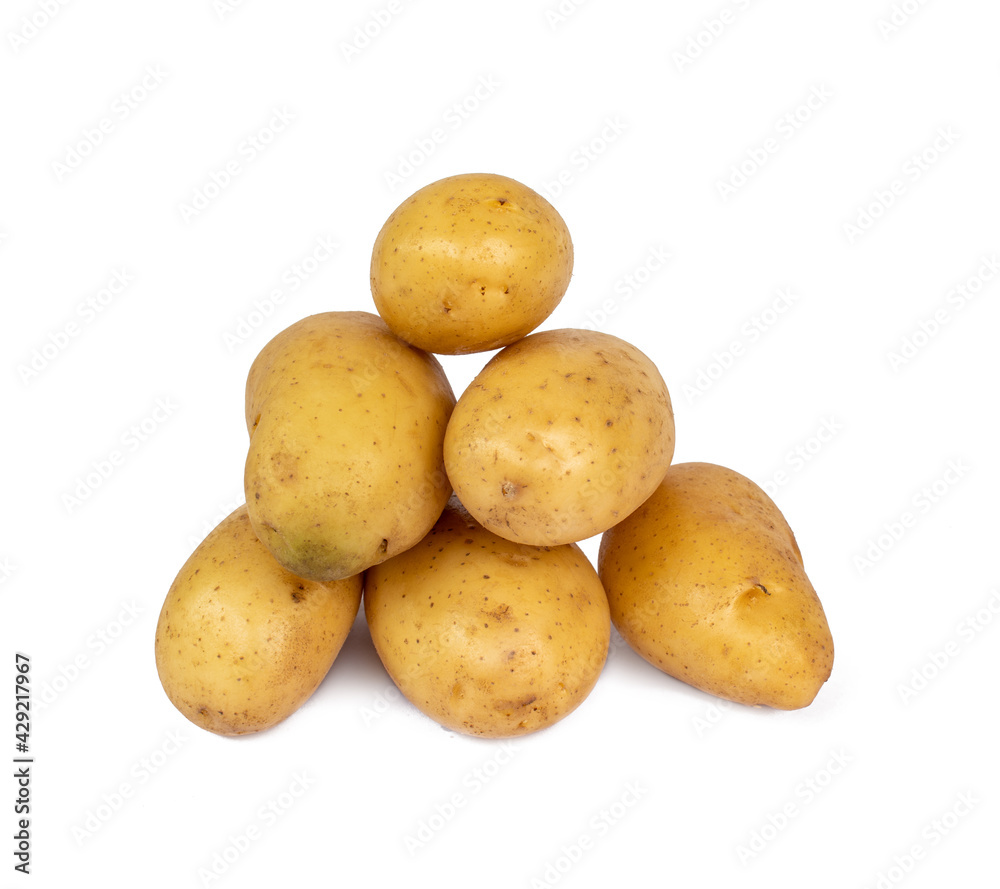 Pile of raw potatoes isolated on white background Pile of raw potatoes isolated on white background