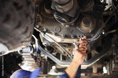 Motor Mechanic below a Heavy goods Vehicle