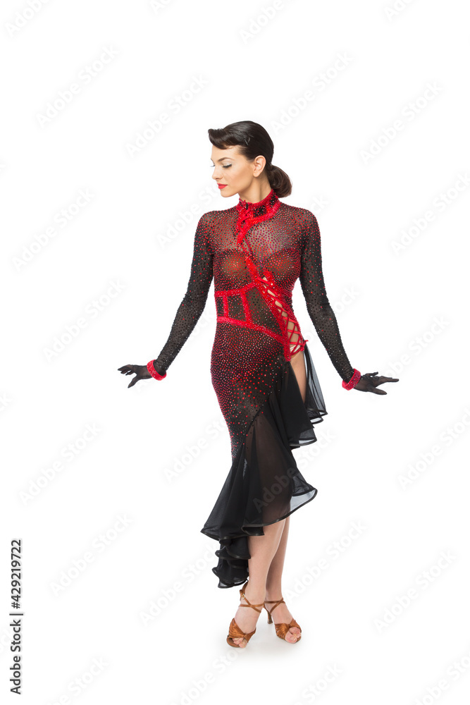 Beautiful young latino dancer woman in an amazing and shiny dress. Beautiful young latino dancer woman in an amazing and shiny dress.