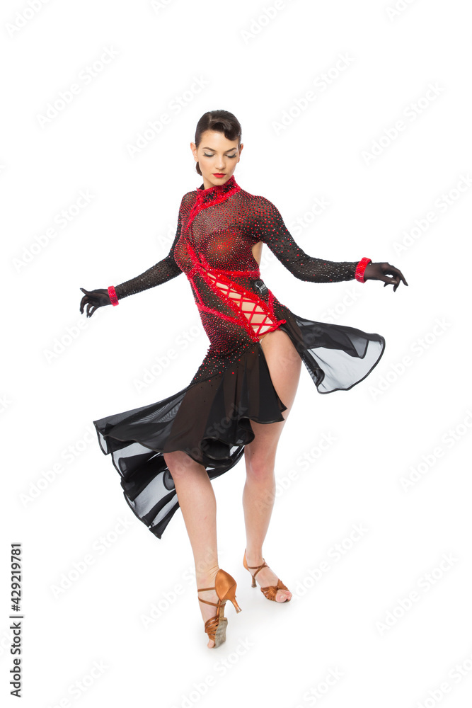 Beautiful young latino dancer woman in an amazing and shiny dress. Beautiful young latino dancer woman in an amazing and shiny dress.