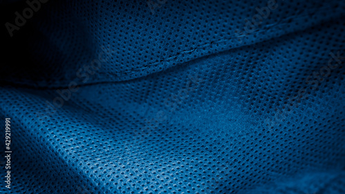 pleated blue cotton material. texture or background