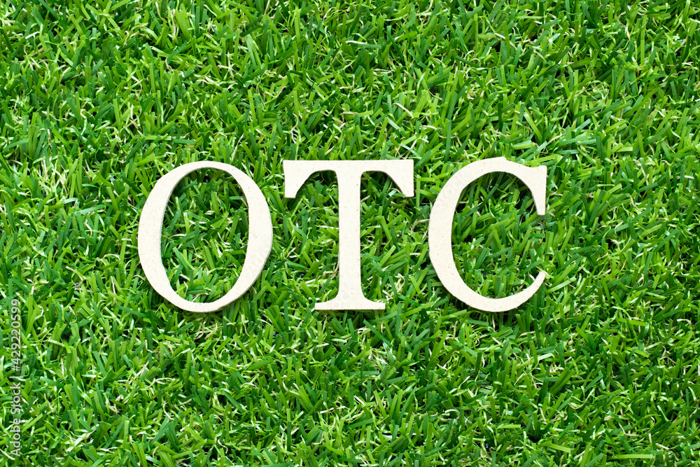 Alphabet letter in word OTC (Abbreviation of over the counter) on green