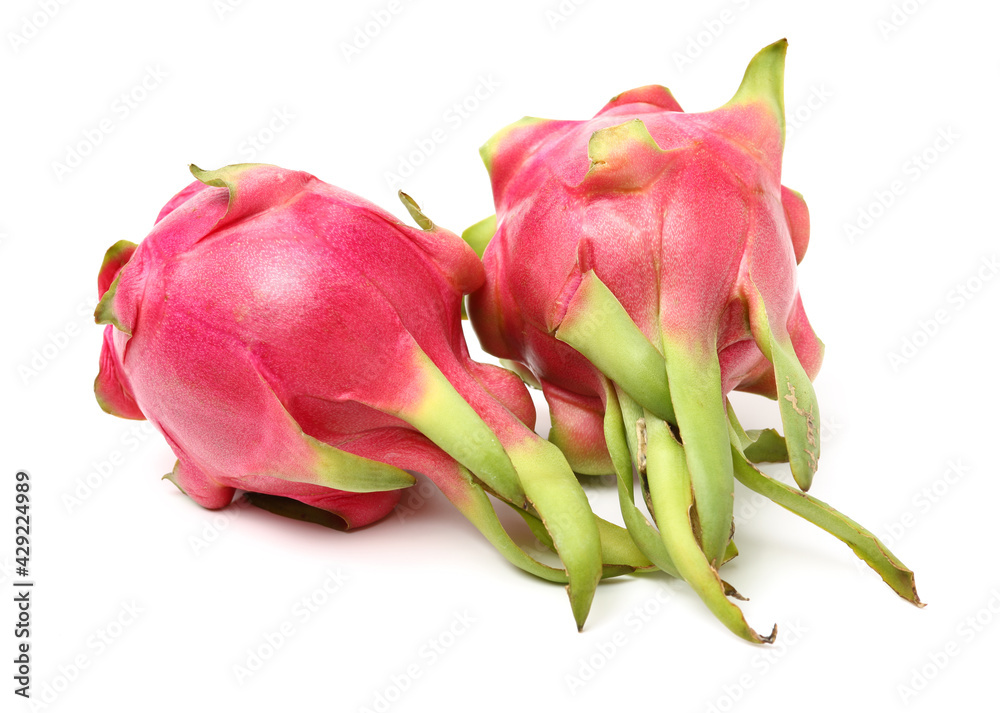 Pitaya or Dragon Fruit isolated against white background Pitaya or Dragon Fruit isolated against white background