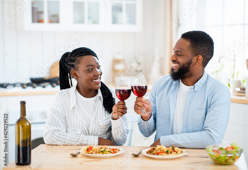 Quarantine Dates. Happy Black Couple Drinking Wine And Having Lunch At Home
