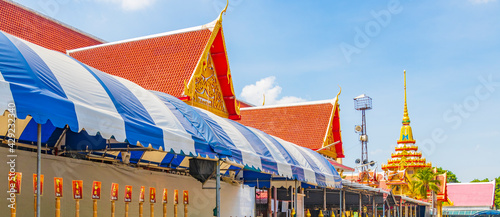 Colorful Wat Don Mueang Phra Arramluang buddhist temple Bangkok Thailand. photo