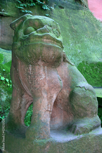 statue of lion in leshan in china 