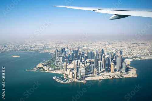 Aerial Wide Shot of Modern Skyscrapers and Apartment Buildings in Downtown Doha (West Bay) on a Sunny Clear Day - Doha, Qatar
 photo
