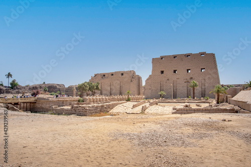 Ancient ruins of the Karnak Temple in Luxor (Thebes), Egypt. The largest temple complex of antiquity in the world. UNESCO World Heritage. View from sphinxes alley. photo